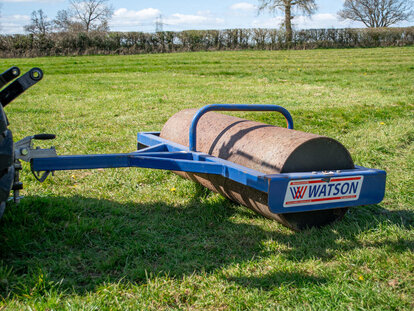 roller attachment on a john deere compact tractor