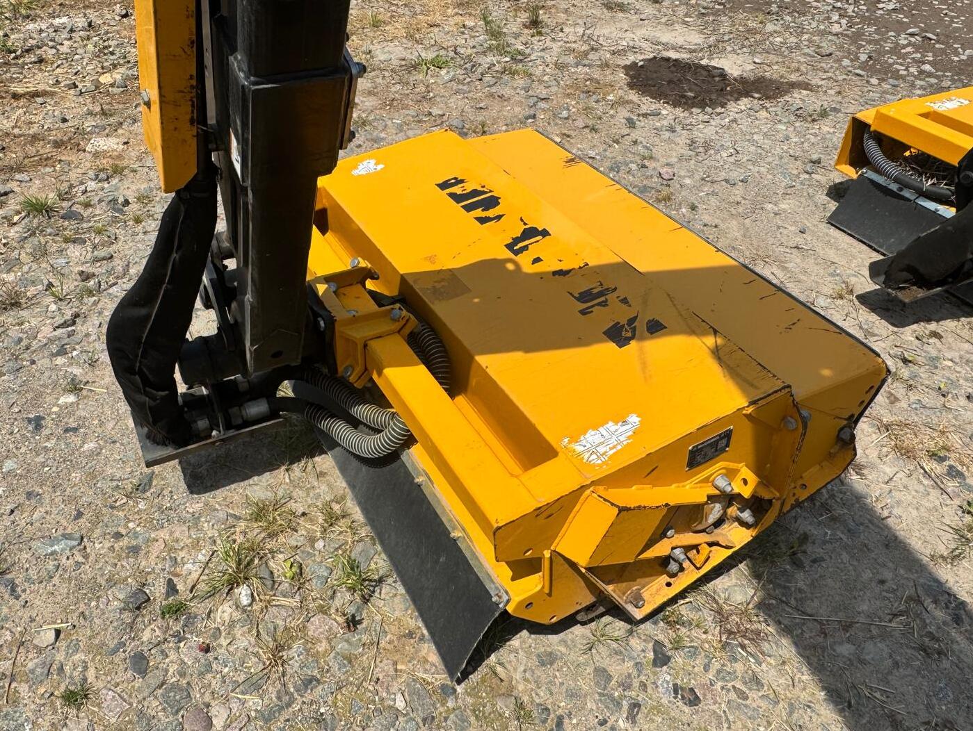 McConnel PA6567T hedgecutter in a yard