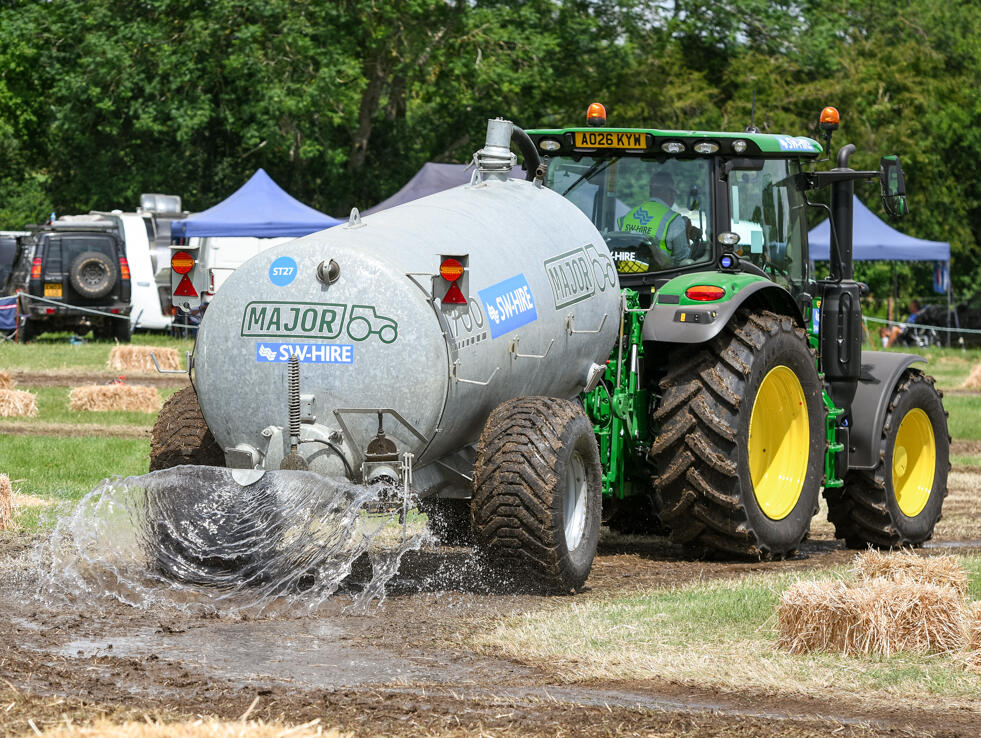 SW-Hire Major 1700 gallon tanker and john deere 6r130 laying water for dust suppression on a lawn mower racing track