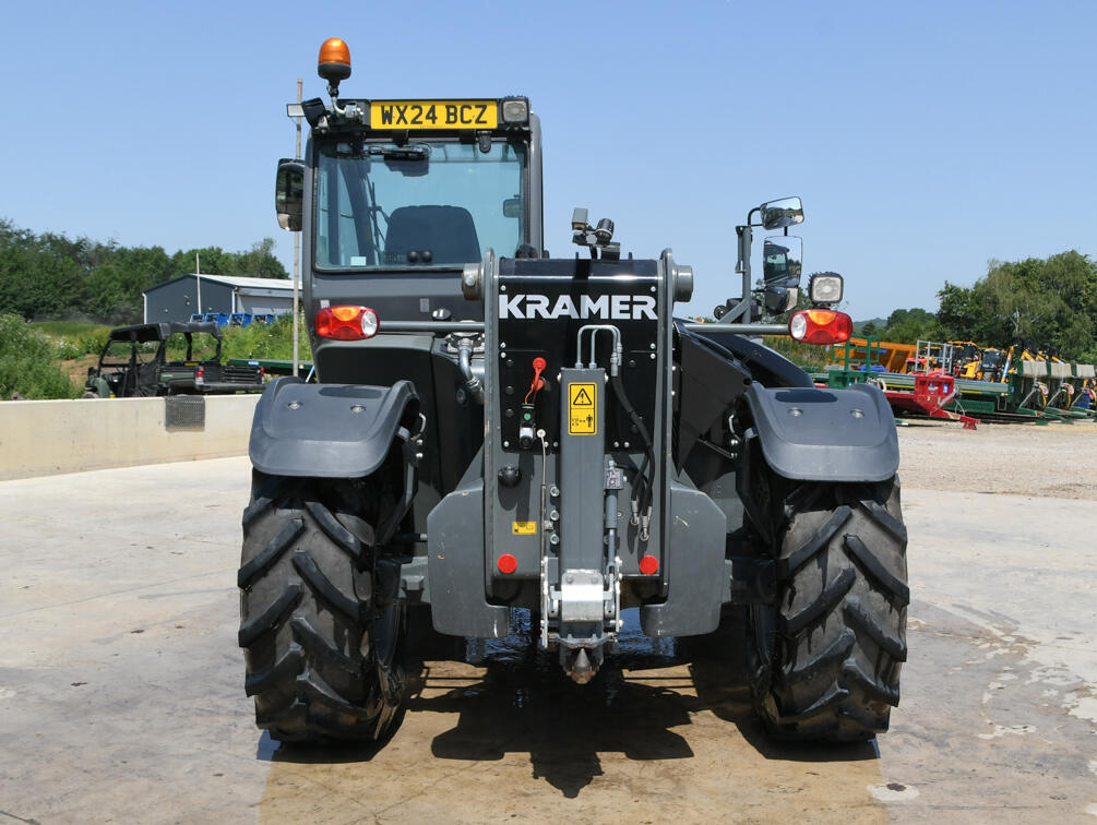 Kramer KT407 telehandler on wash bay