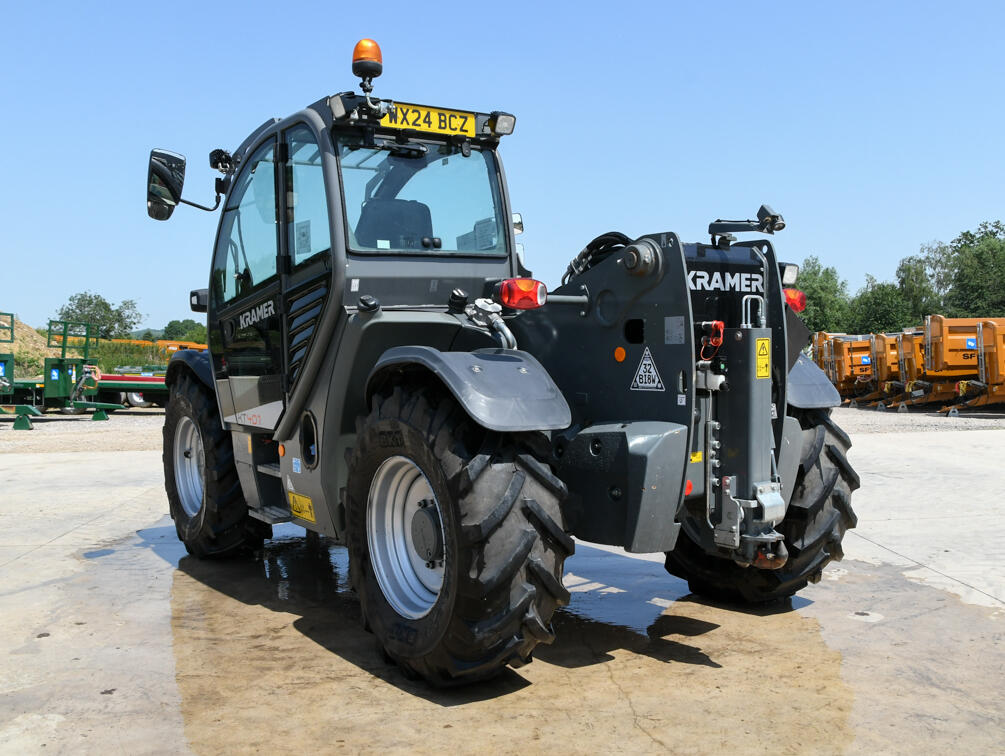 Kramer KT407 telehandler on wash bay
