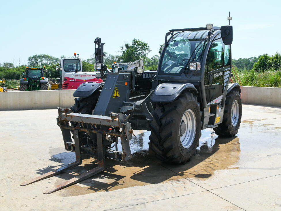 Kramer KT407 telehandler on wash bay