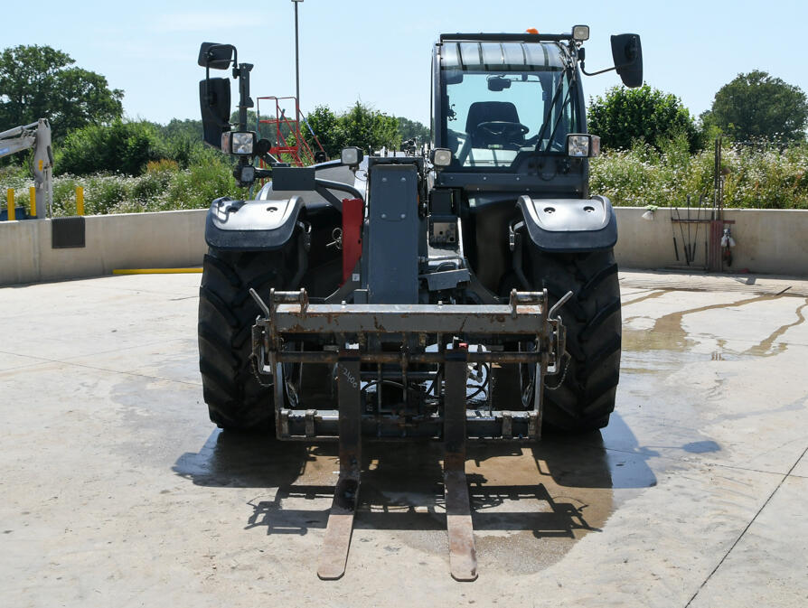 Kramer KT407 telehandler on wash bay