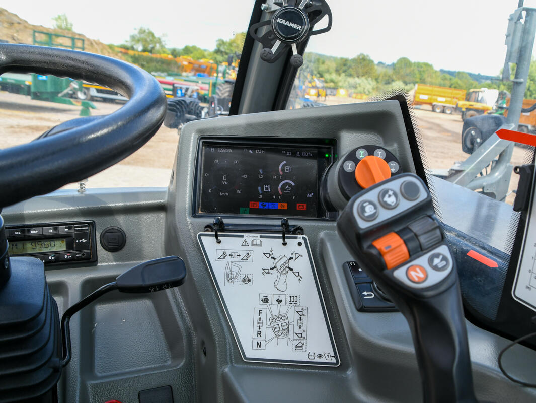 Kramer KT407 telehandler on wash bay