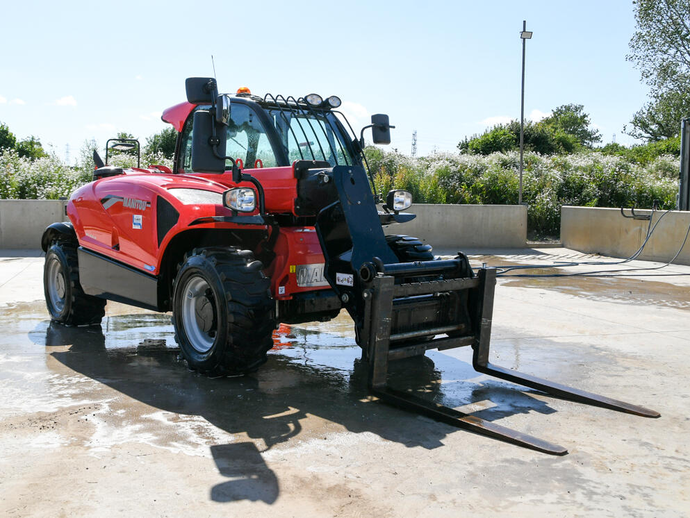 Manitou MT625 telehandler on a wash bay