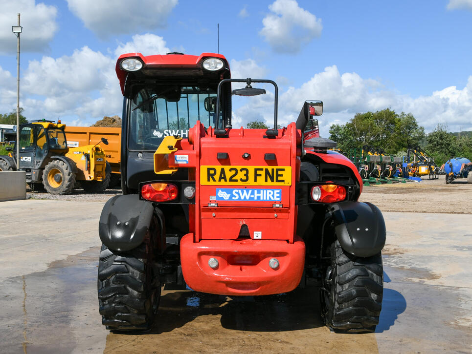 Manitou MT625 telehandler on a wash bay