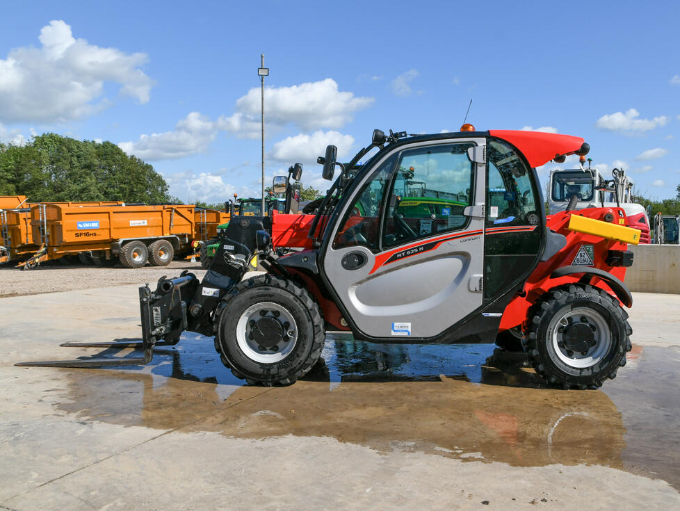 Manitou MT625 telehandler on a wash bay
