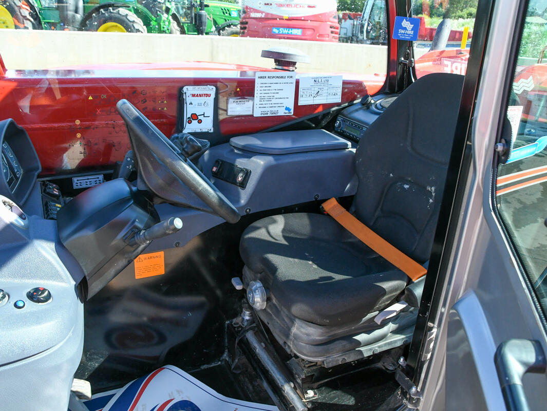 Manitou MT625 telehandler on a wash bay