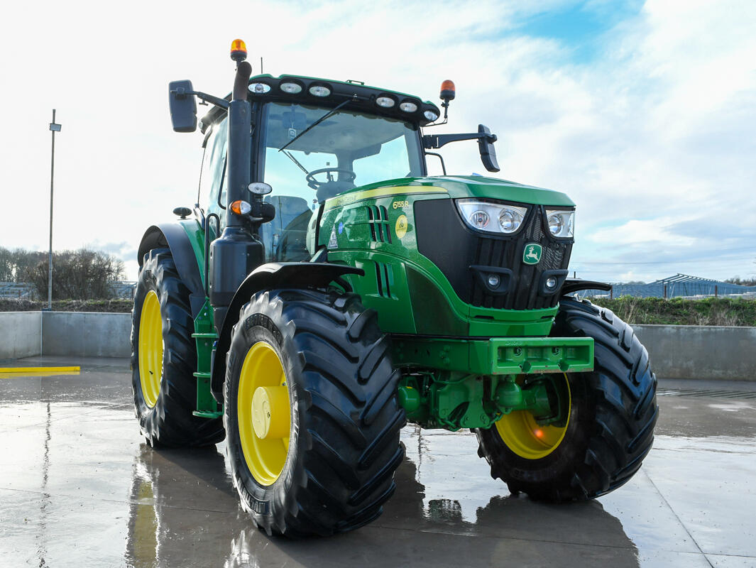 John Deere 6155R on a washbay