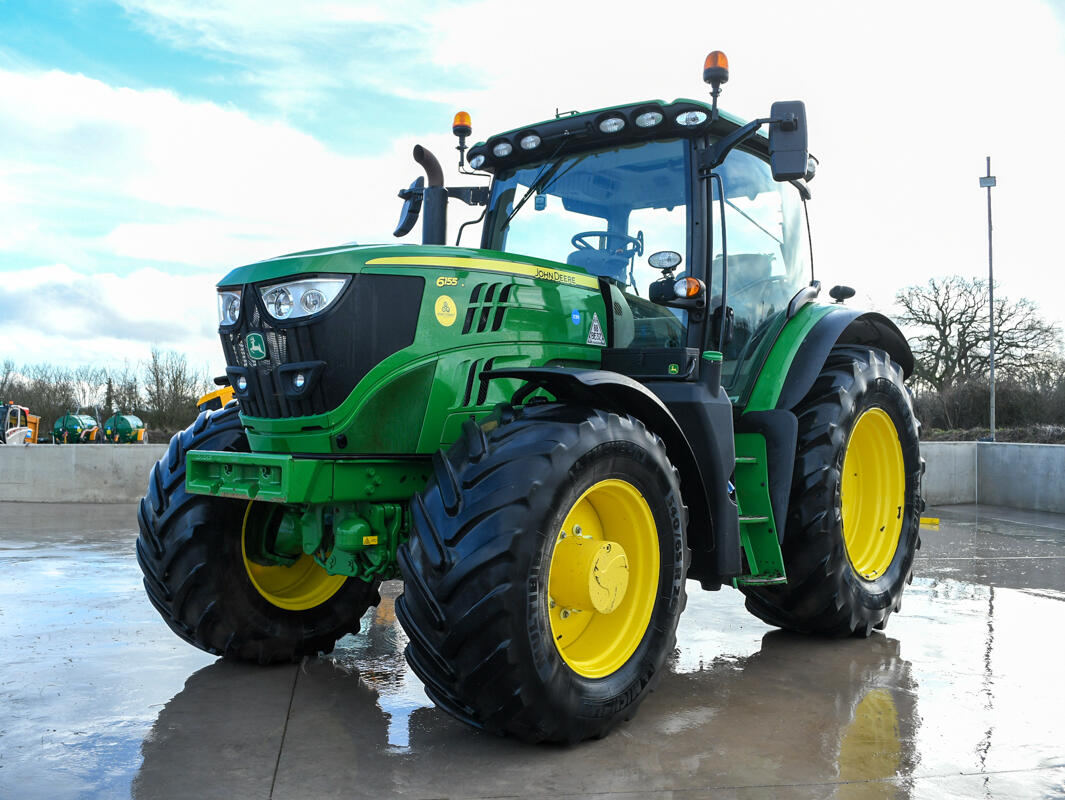 John Deere 6155R on a washbay