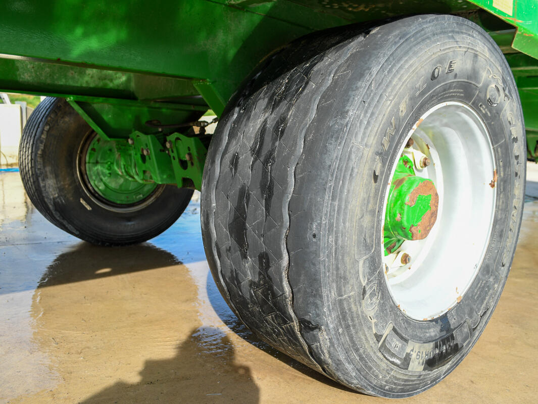 Green 24ft AW Flatbed Trailer on a wash bay