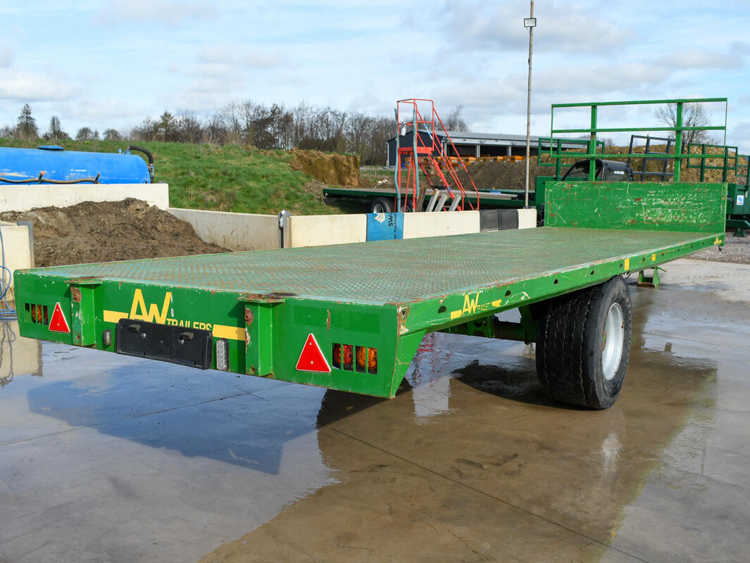 Green 24ft AW Flatbed Trailer on a wash bay