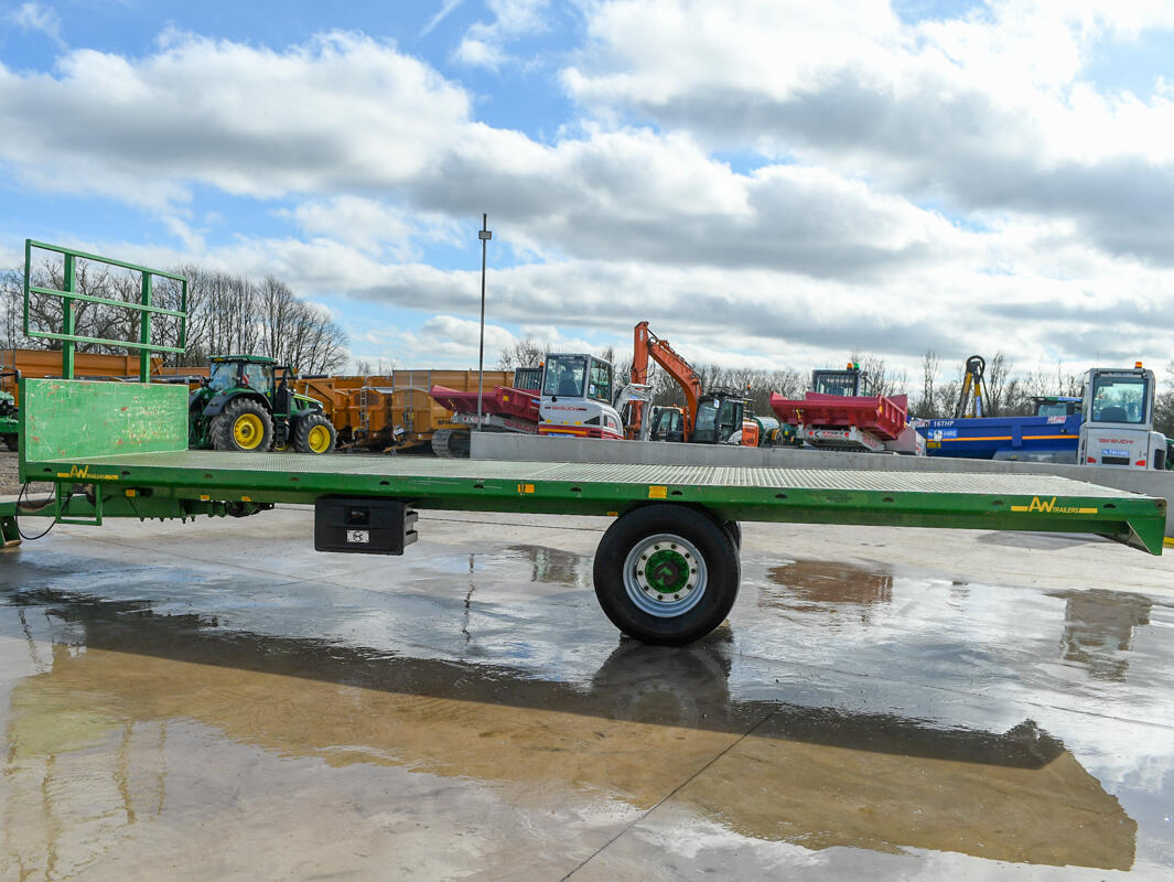 Green 24ft AW Flatbed Trailer on a wash bay