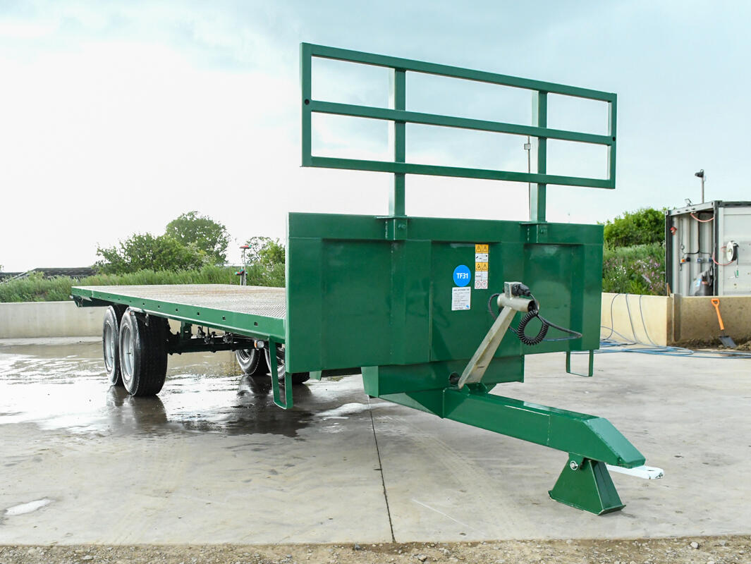 28ft Bailey flatbed trailer on a wash bay