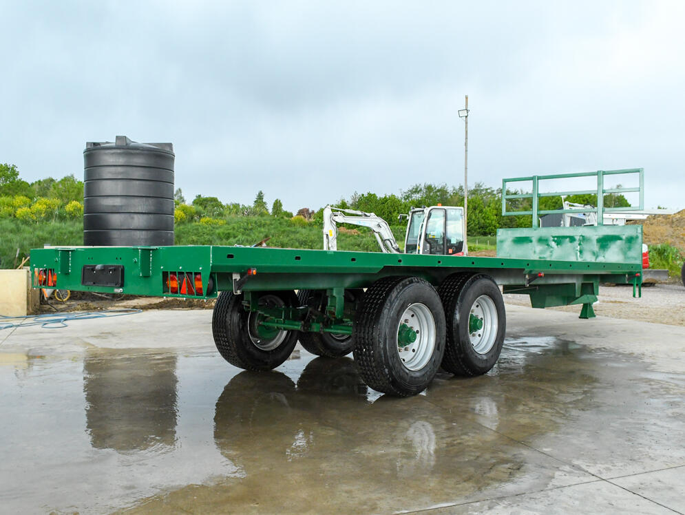 28ft Bailey flatbed trailer on a wash bay