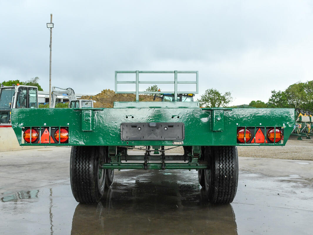 28ft Bailey flatbed trailer on a wash bay