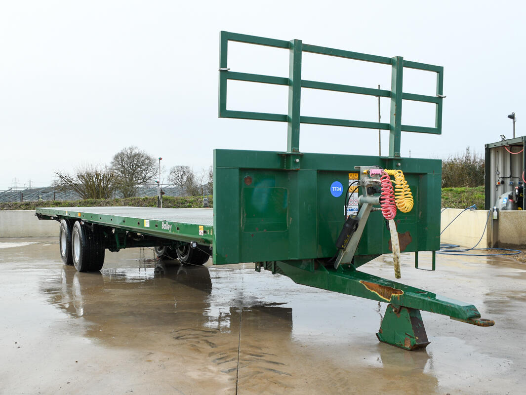 36ft Green Bailey Flatbed Trailer on a wash bay