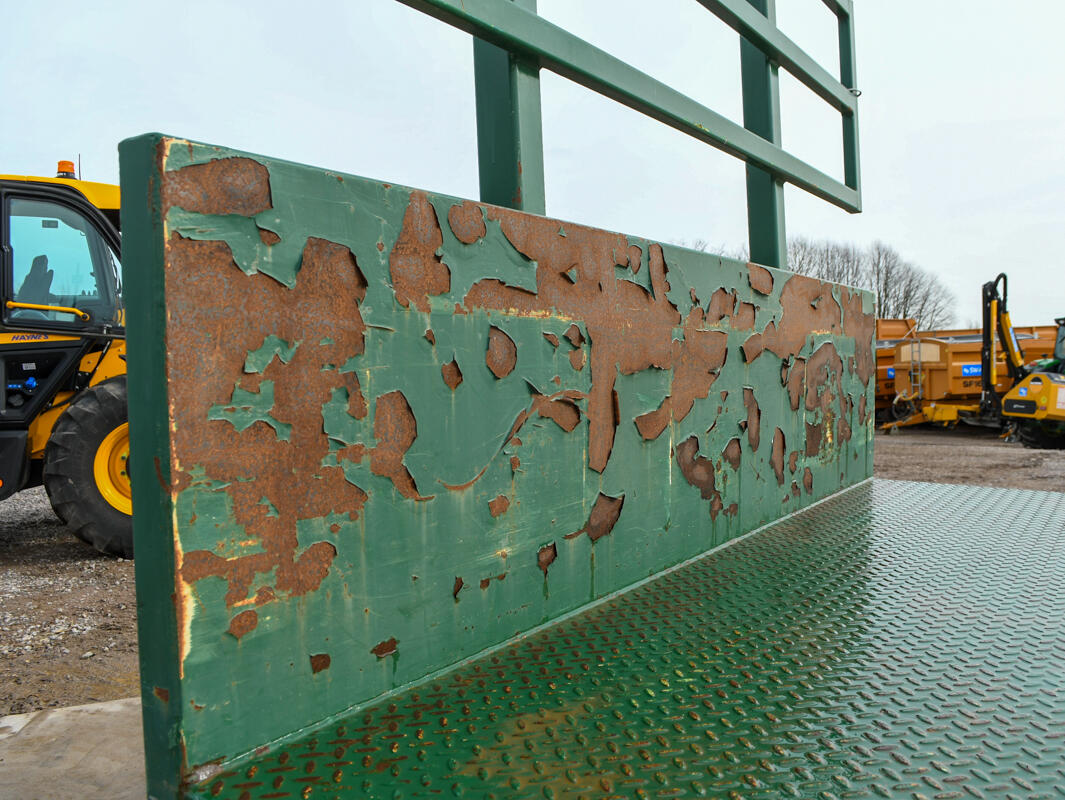 36ft Green Bailey Flatbed Trailer on a wash bay