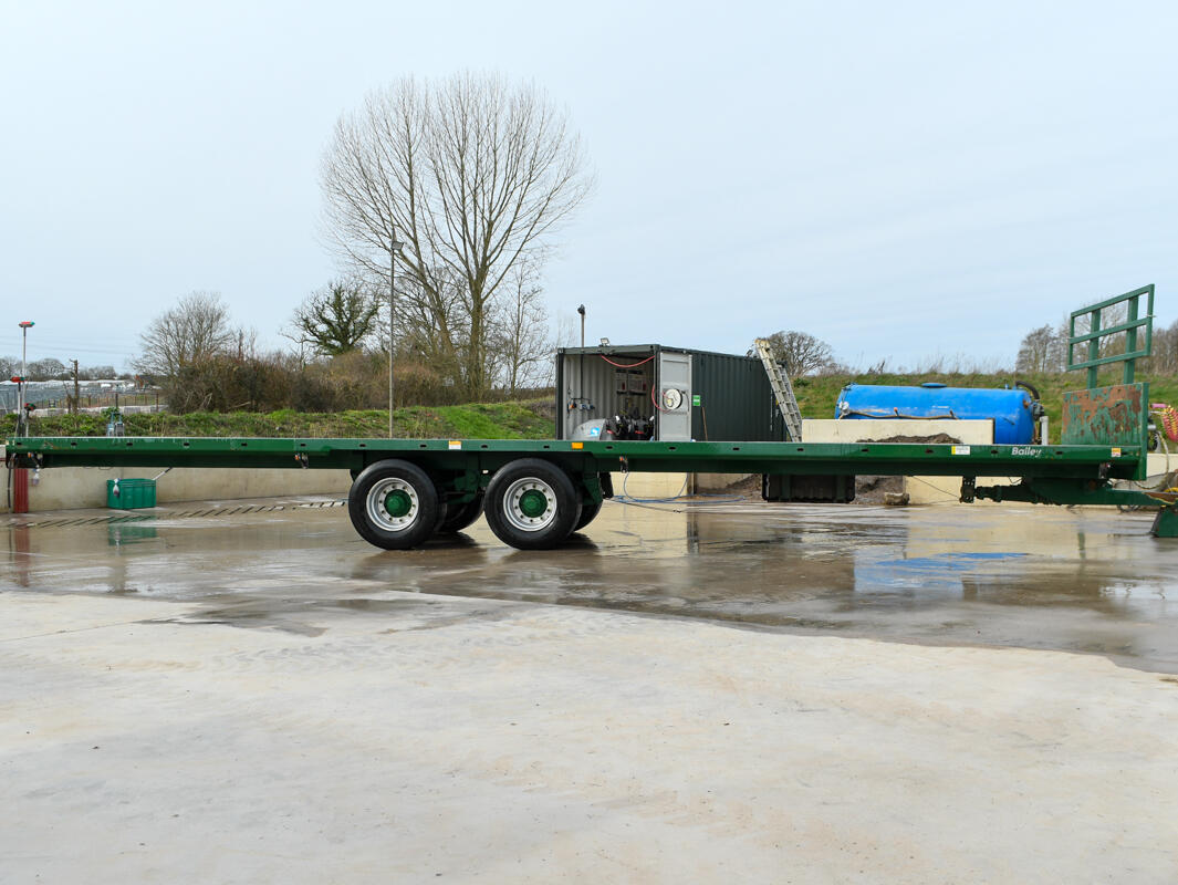 36ft Green Bailey Flatbed Trailer on a wash bay