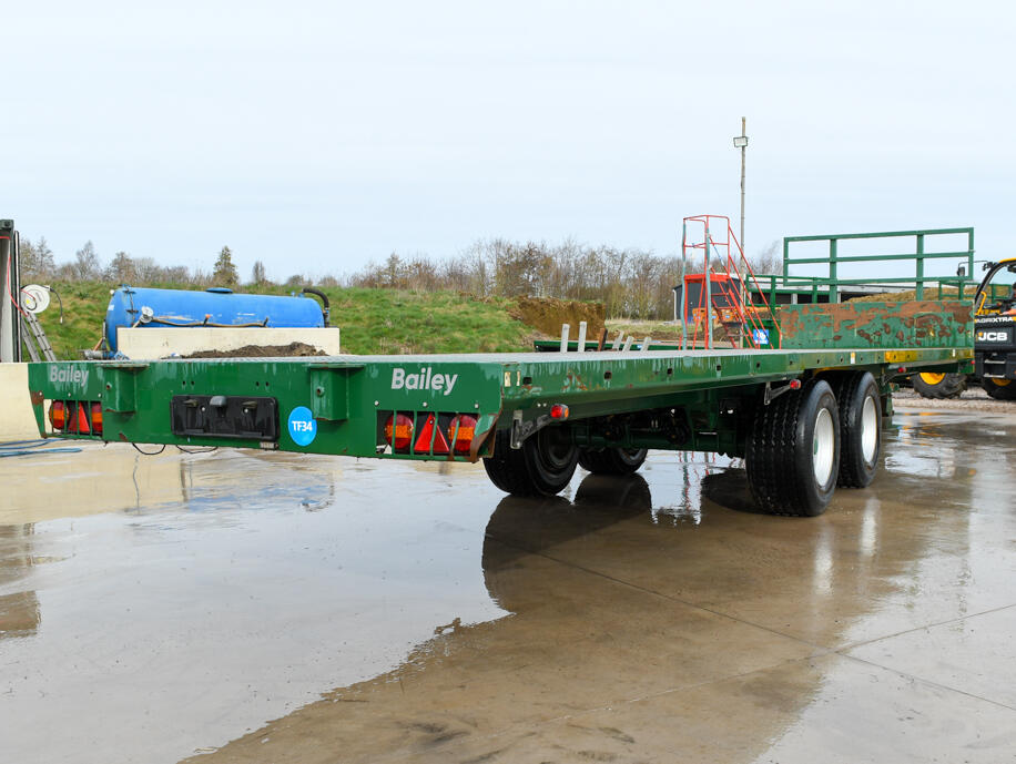 36ft Green Bailey Flatbed Trailer on a wash bay