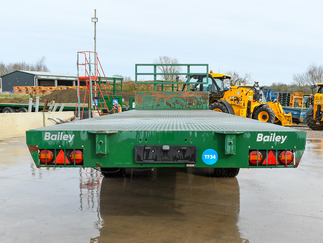 36ft Green Bailey Flatbed Trailer on a wash bay