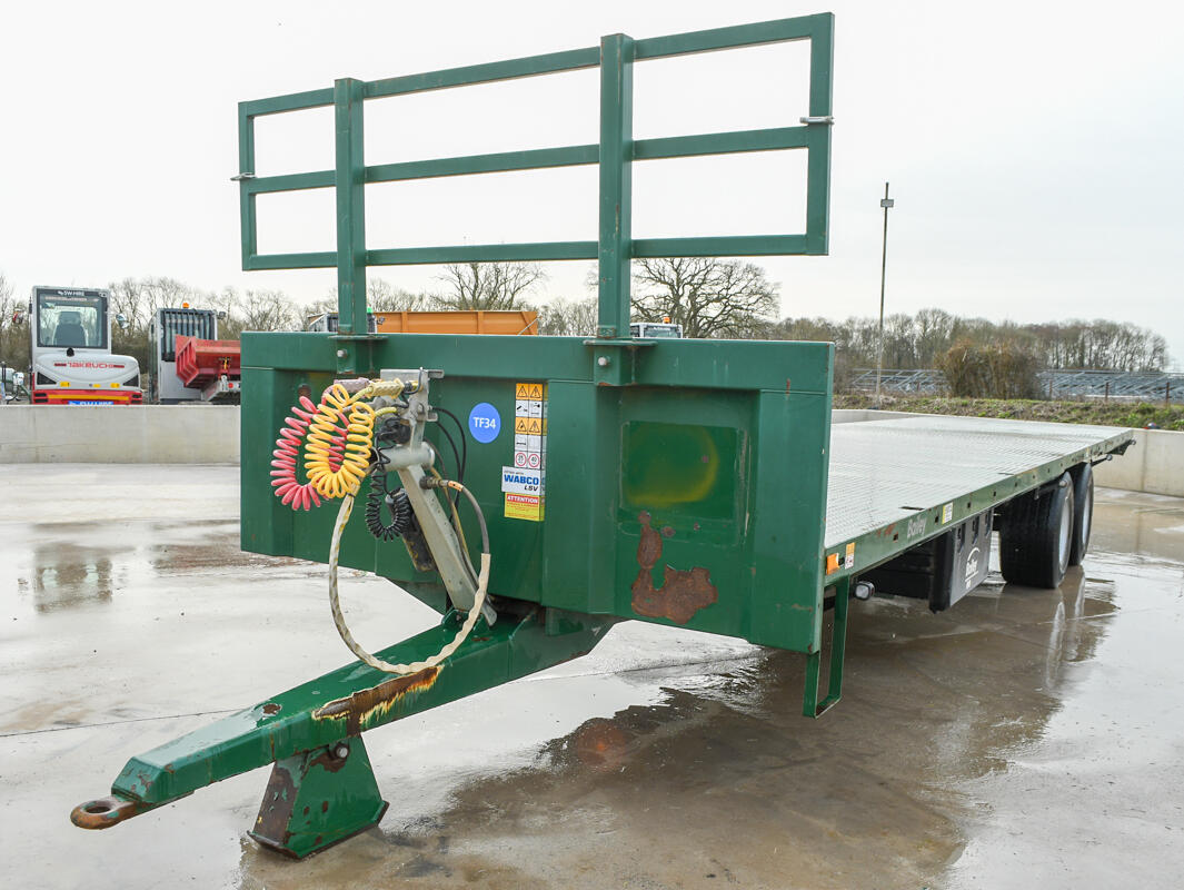 36ft Green Bailey Flatbed Trailer on a wash bay