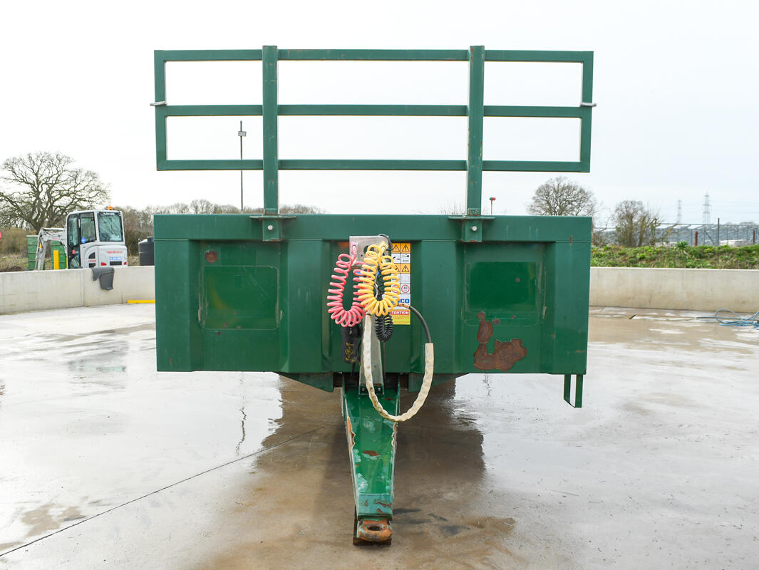 36ft Green Bailey Flatbed Trailer on a wash bay