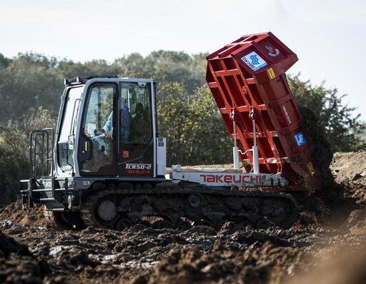 SW Hire Takeuchi 6.5 tonne Tracked Dumper tipping soil