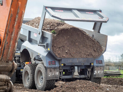 JPM 16t dump trailer with rear door lifted